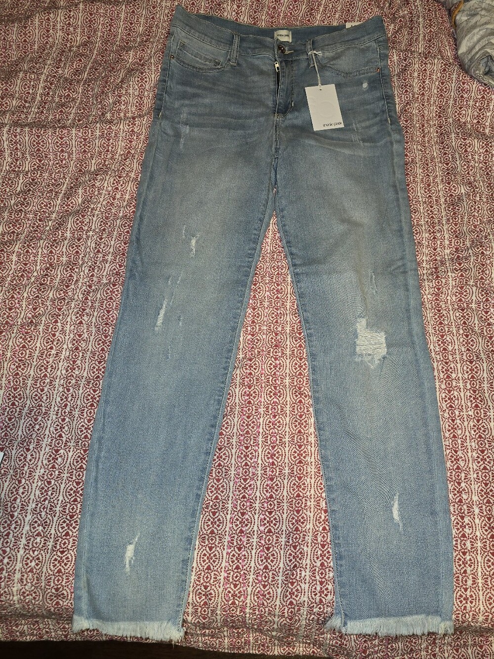 Sneak Peek Light Blue Distressed Skinny Jeans